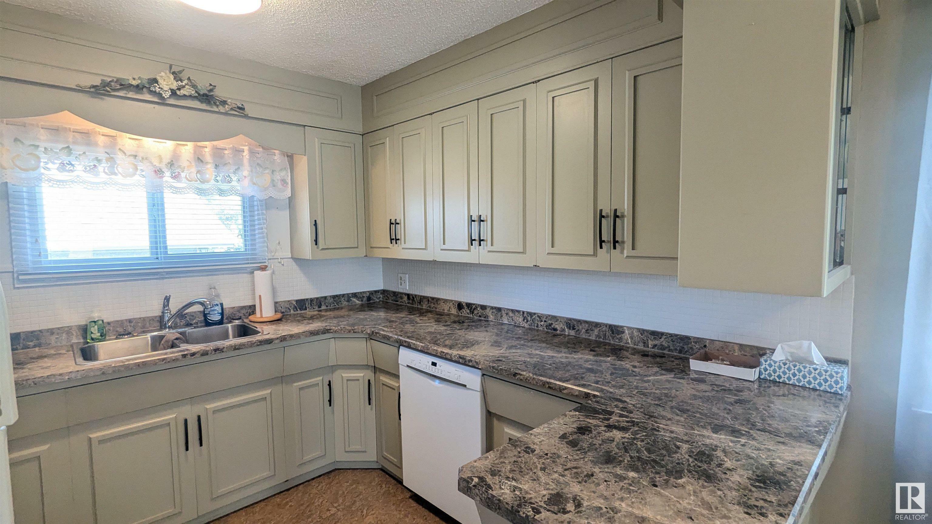 Property Photo: 5466 45 Street AB T9C 1C9
