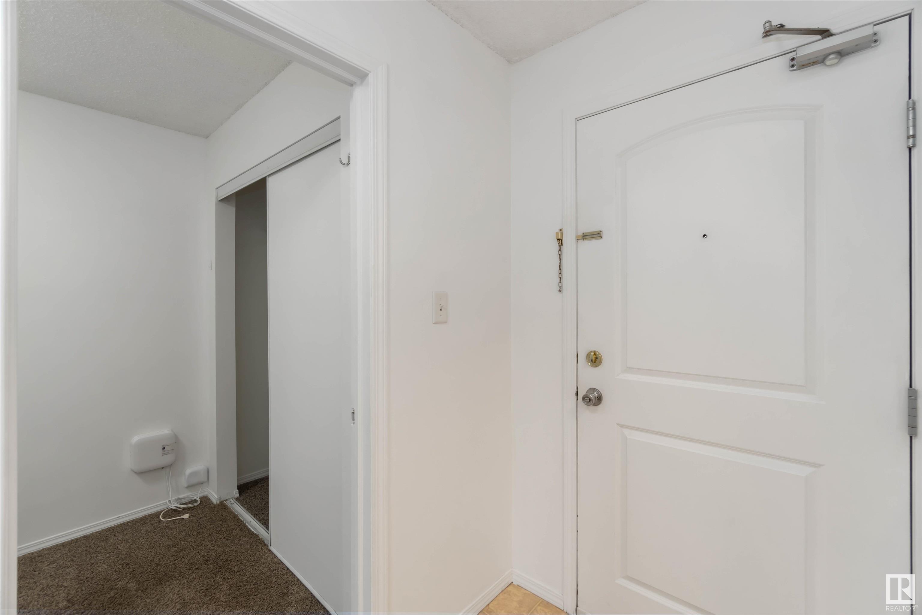 Property Photo: 70 Woodsmere Close 118 AB T8L 4R8