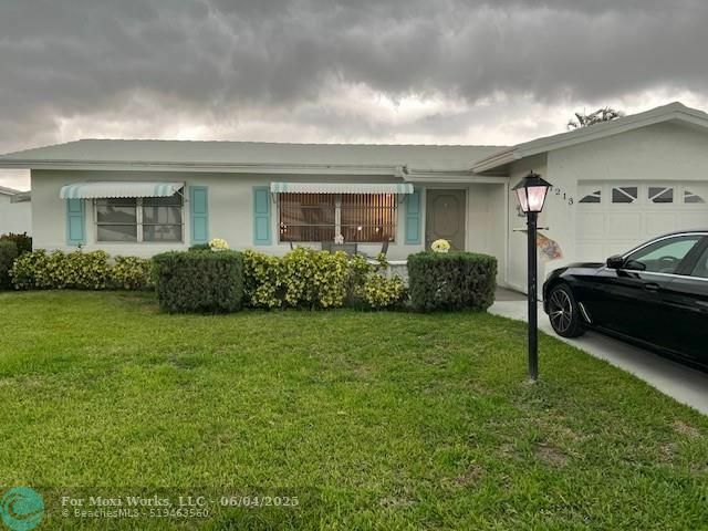 Property Photo: 1213 SW 20th FL 33426