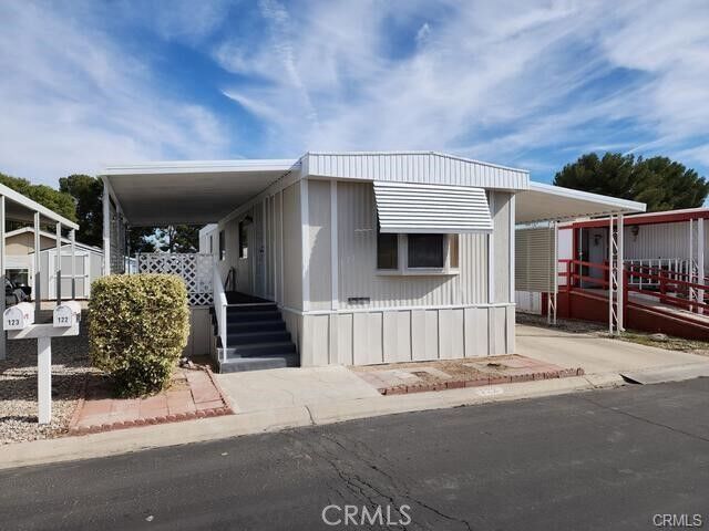 Property Photo:  13393 Mariposa Road 122  CA 92395 