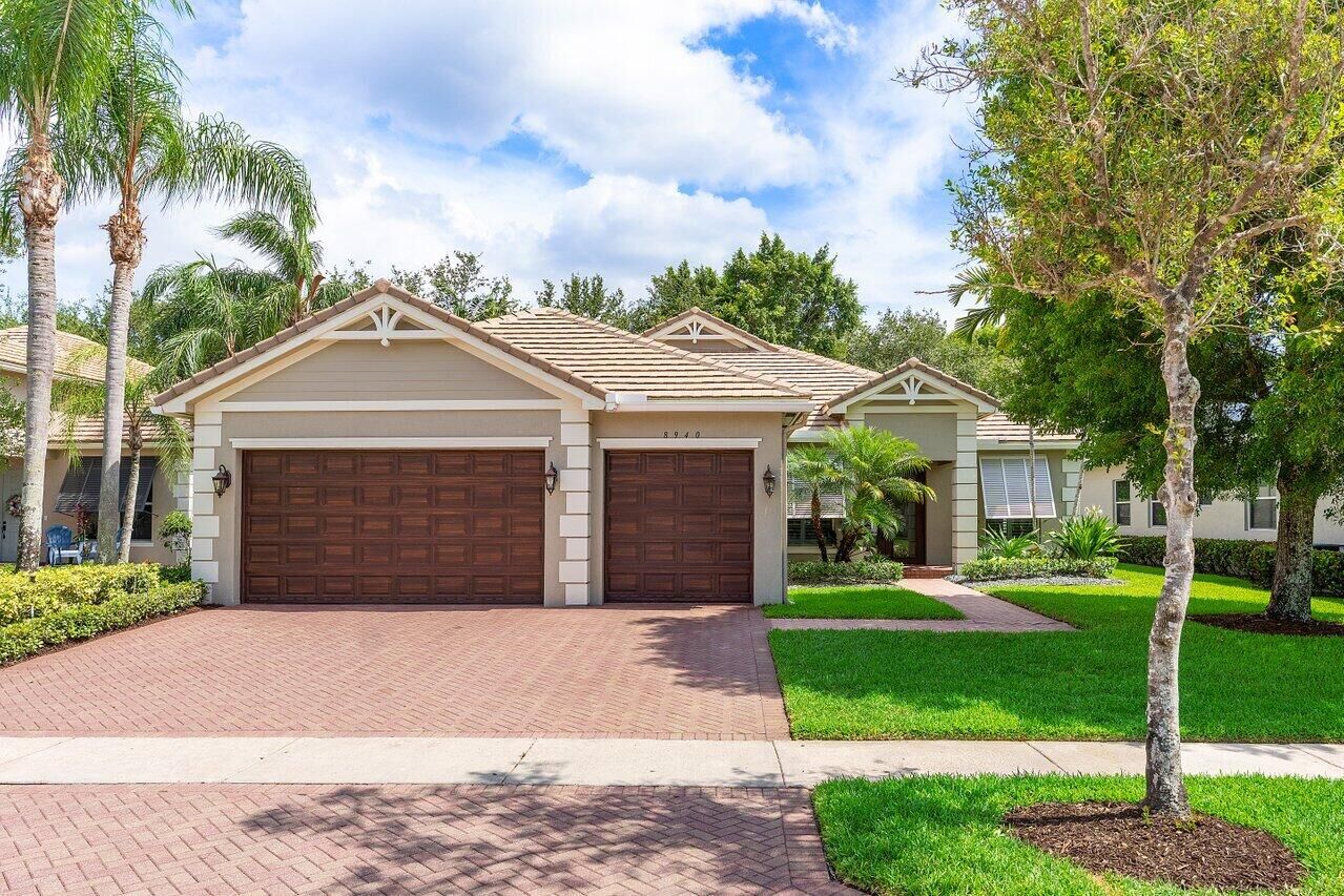 Property Photo:  8940 New Hope Court  FL 33411 