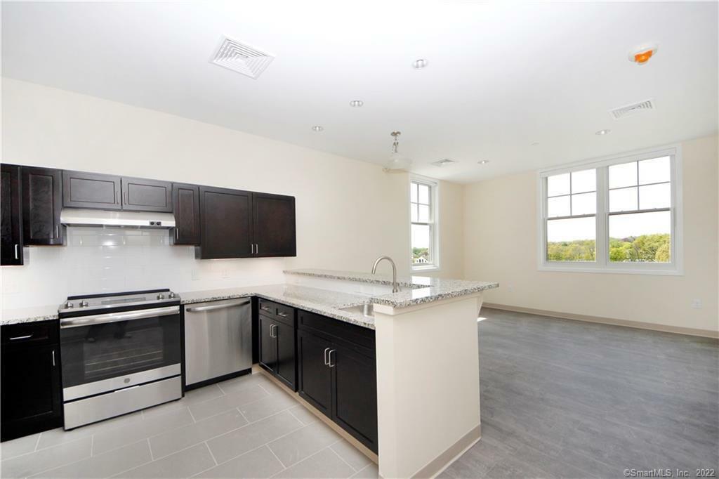 Property Photo: 215 Stillwater Avenue 307 CT 06902