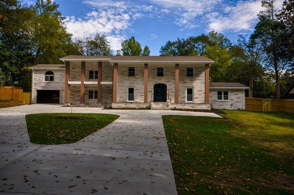 Property Photo: 4395 Woodland Brook Drive SE GA 30339