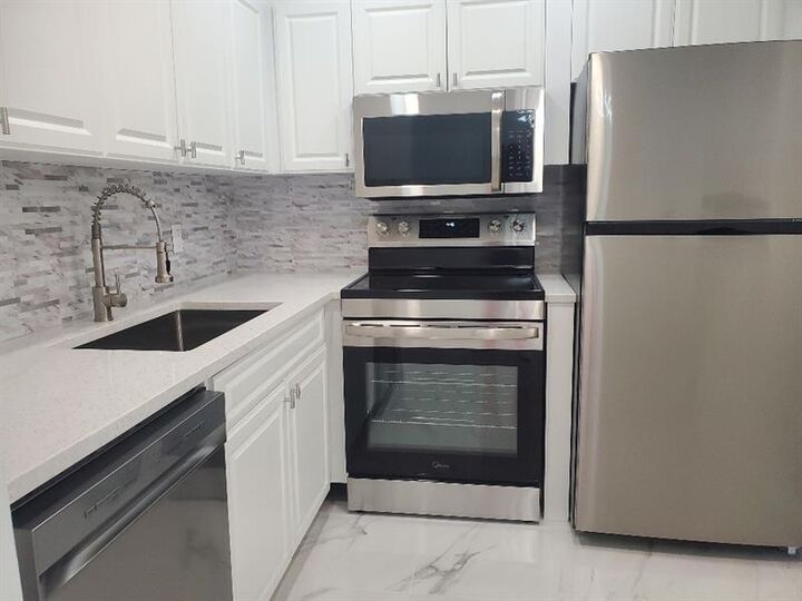 Property Photo:  242 Tilford L  FL 33442 