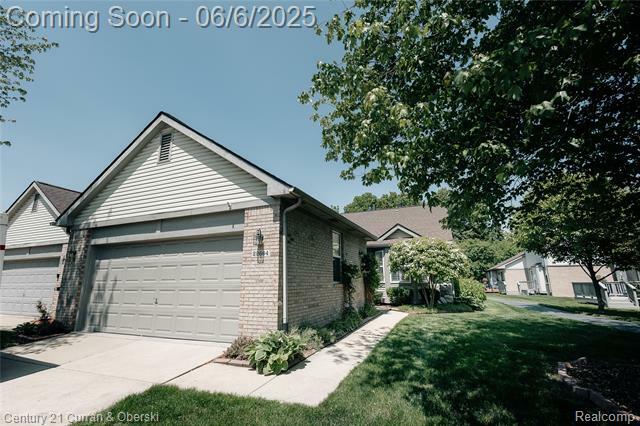 Property Photo:  22664 Woodcreek Drive 93  MI 48180 