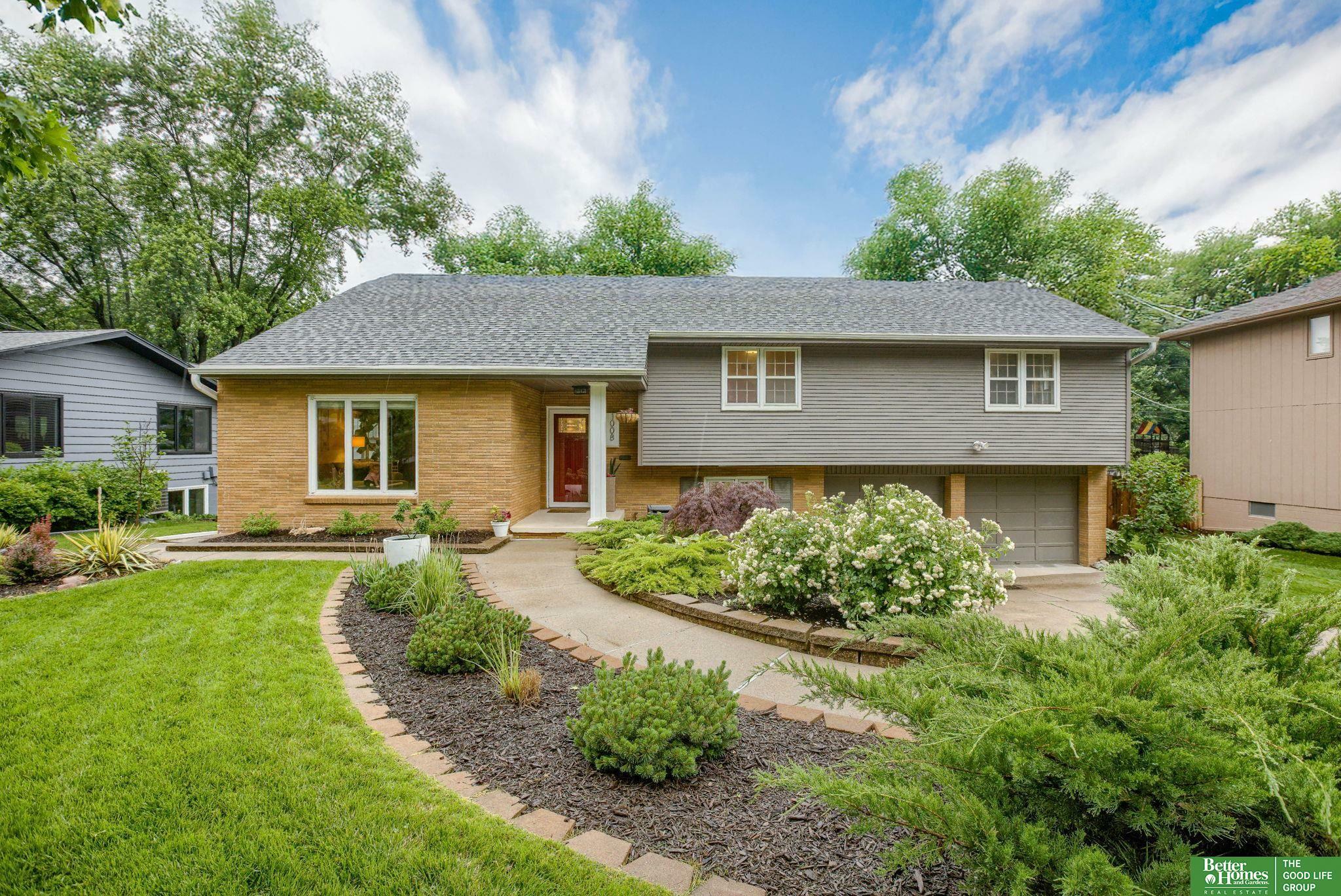 Property Photo: 1008 J E George Boulevard NE 68132