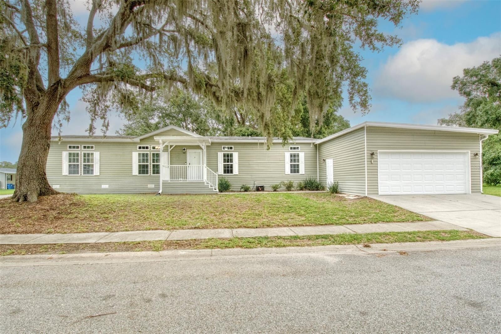 Property Photo: 25156 Buttonwood Drive 126 FL 34705