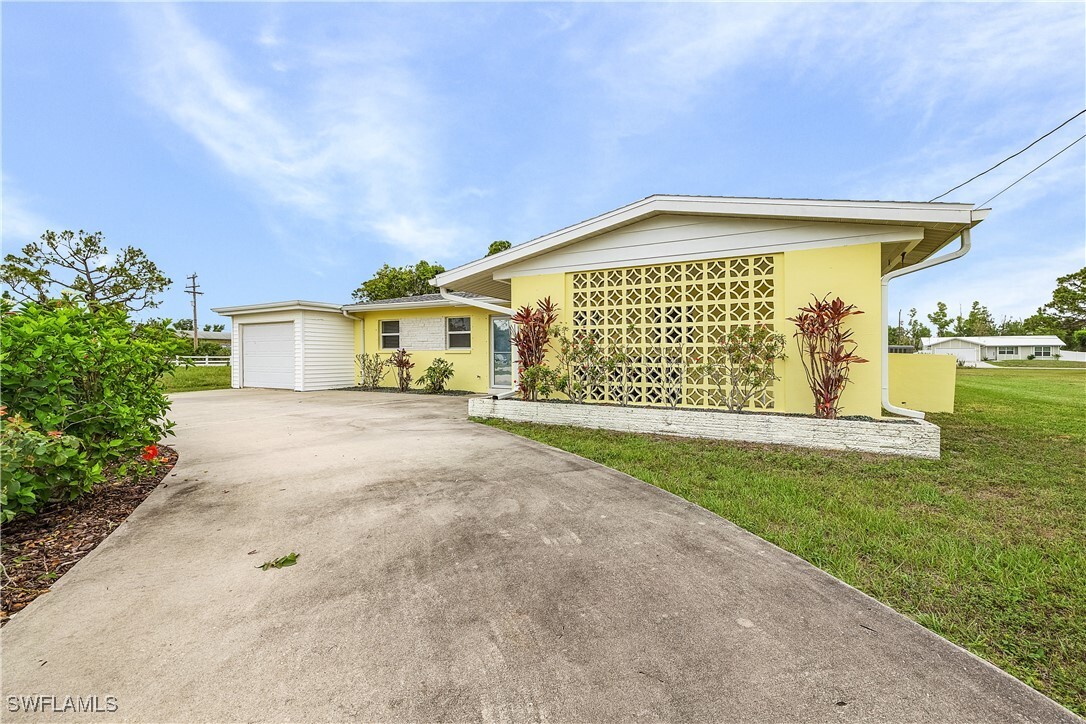 Property Photo:  5802 Genesee Parkway  FL 33922 