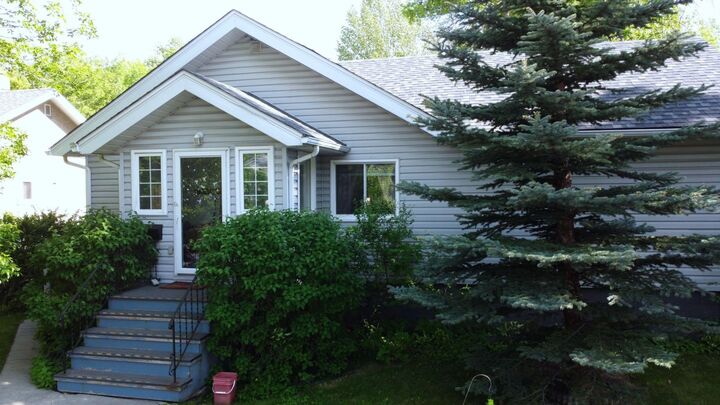 Property Photo: 327 12 Avenue NW AB T2M 0C8