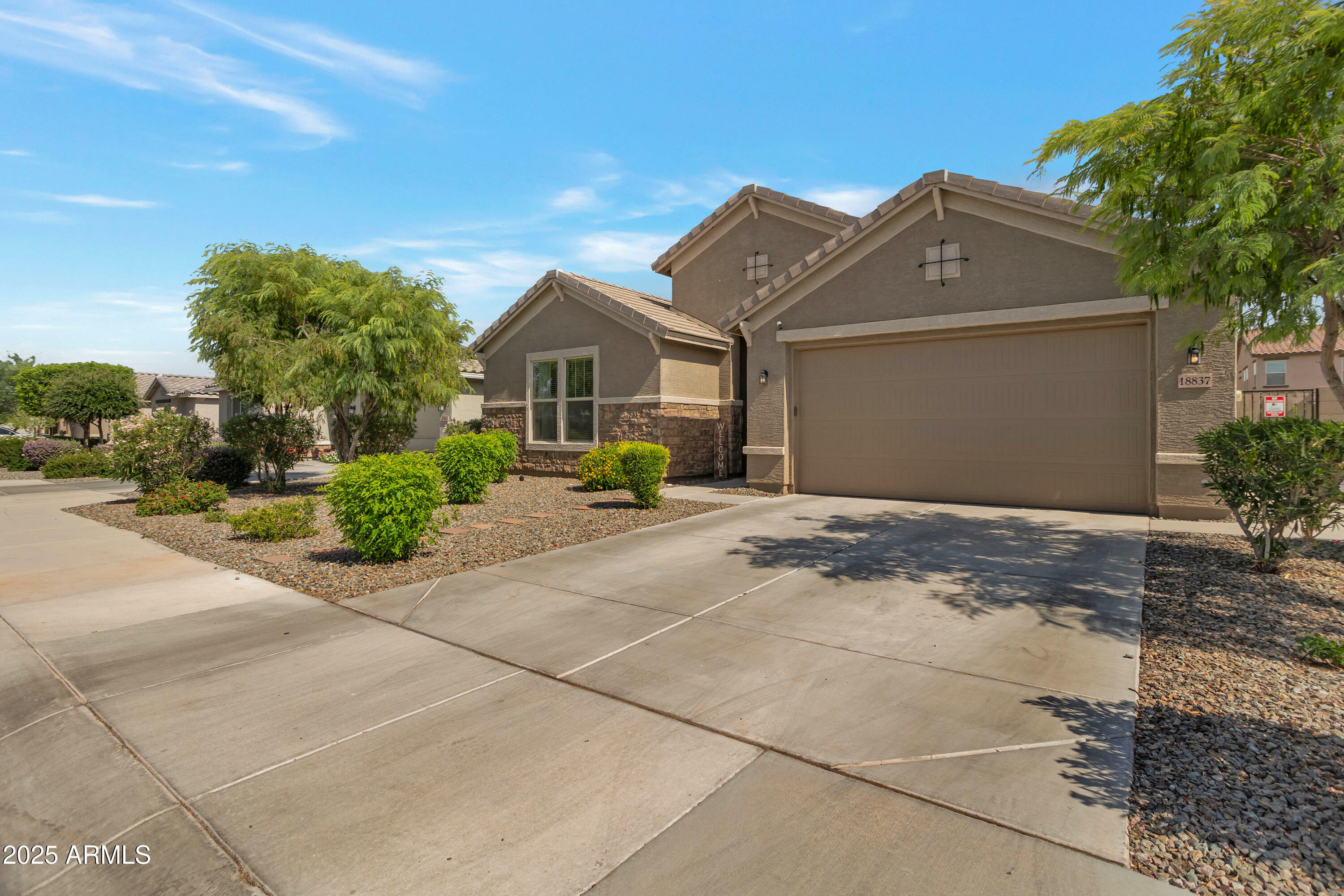 Property Photo: 18837 W San Juan Avenue AZ 85340