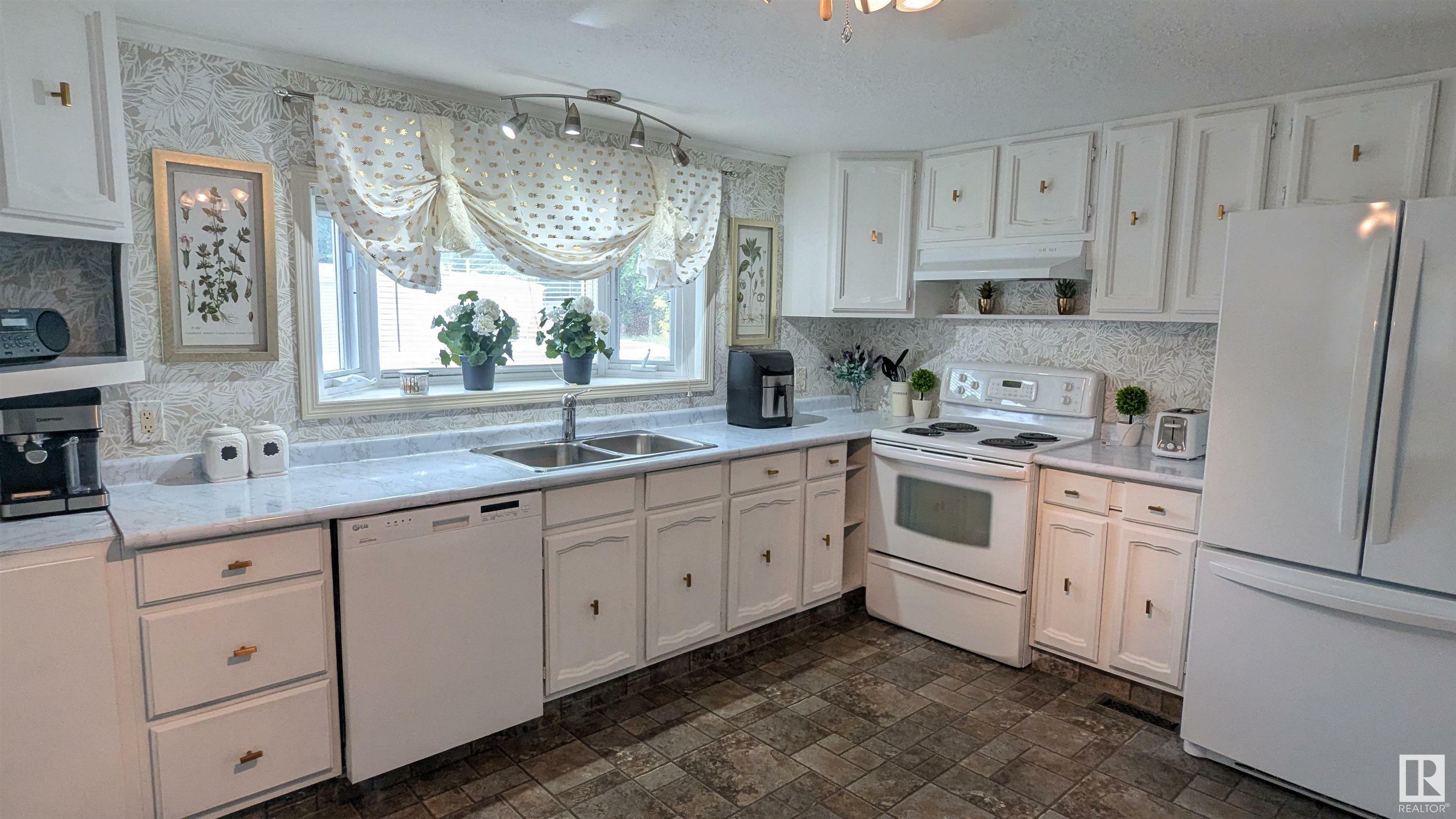 Property Photo: 26 Wood & Garden Estates AB T9C 1E9