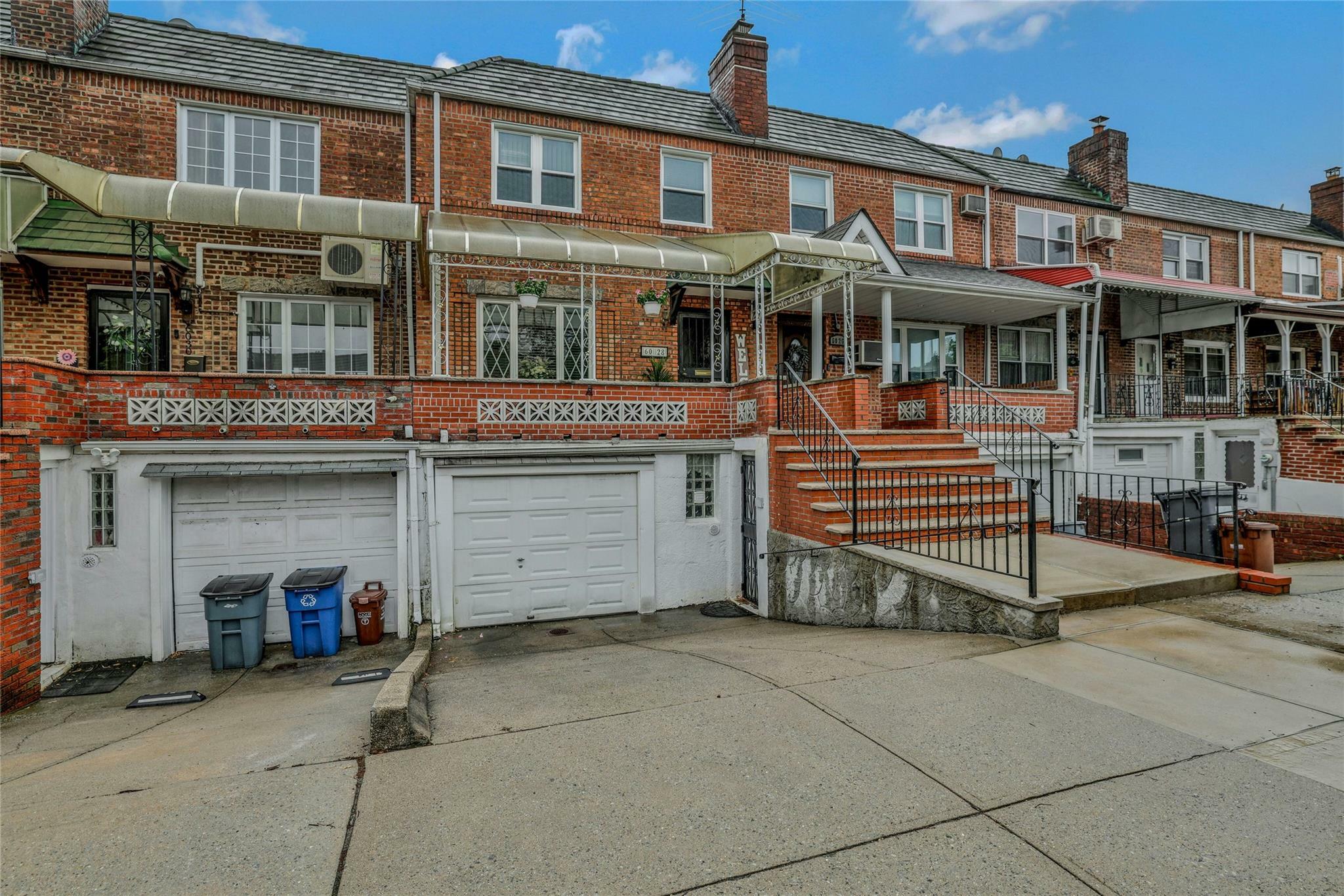 Property Photo: 60-28 77 Place NY 11379