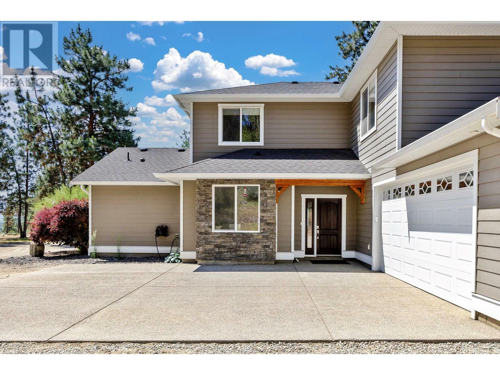 Property Photo:  6281 Postill Lake Road  BC V1X 7V3 