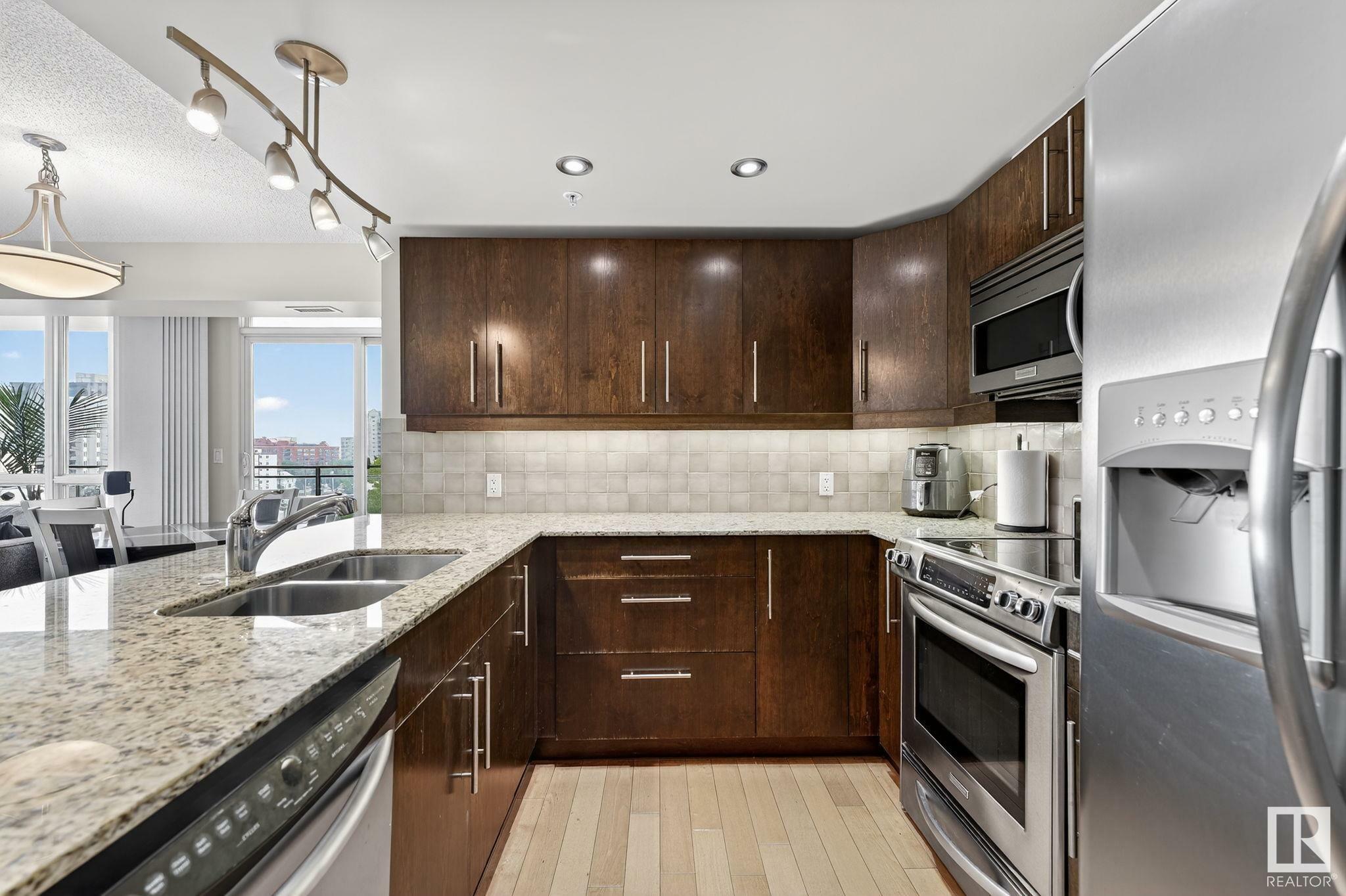 Property Photo: 10046 117 Street NW 604 AB T5K 1X2