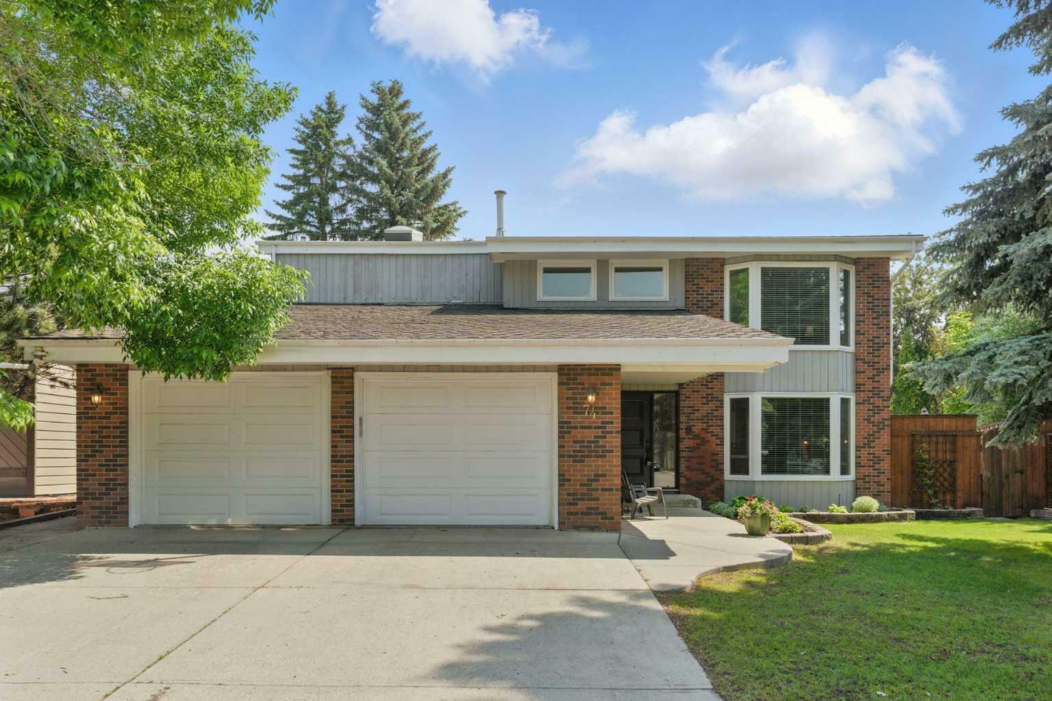 Photo de la propriété: 74 Deermont Road SE AB T2J 5T5