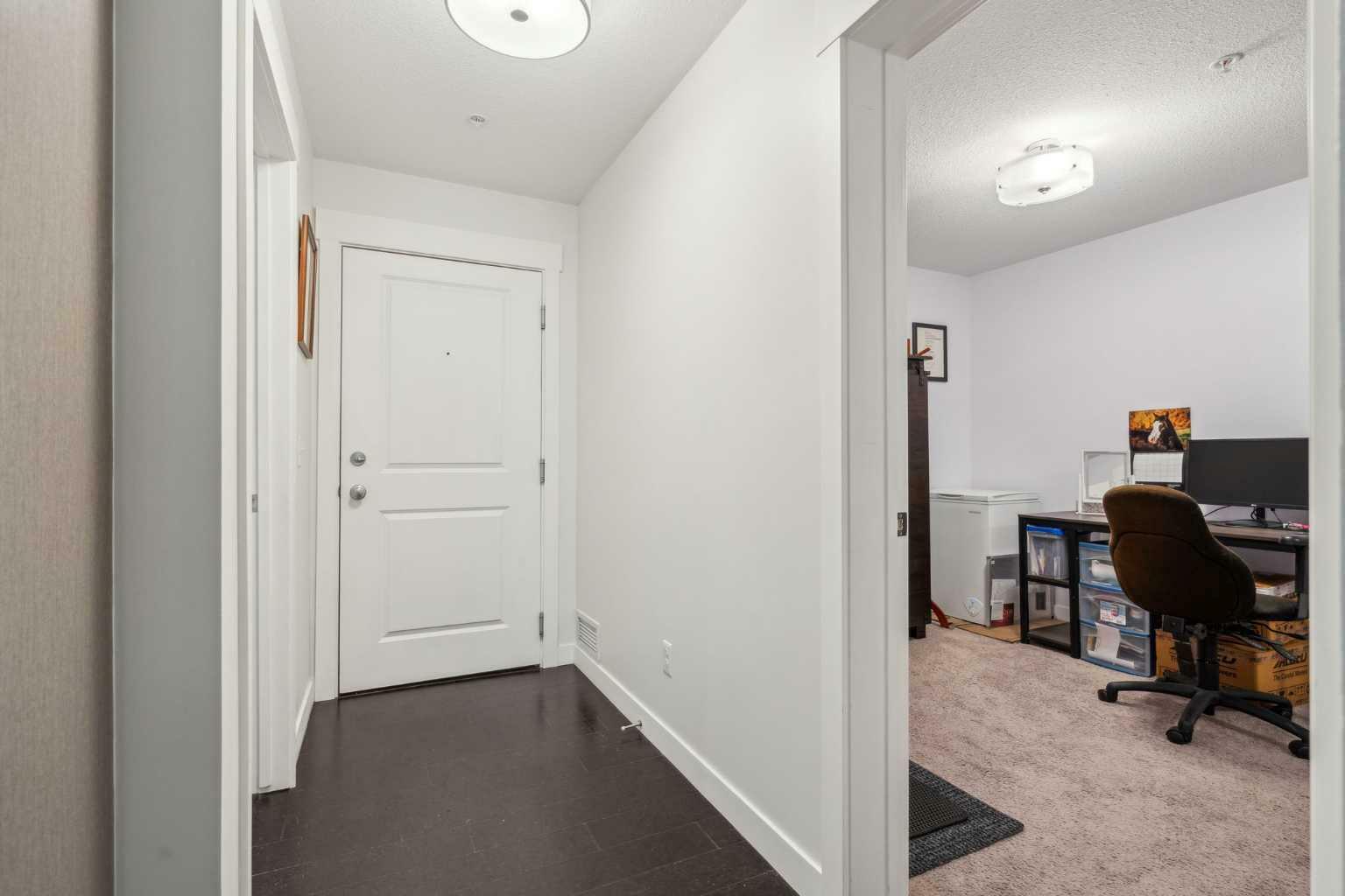 Property Photo: 11 Mahogany Row SE 2109 AB T3M 2L6