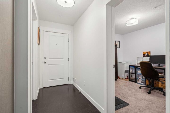 Property Photo: 11 Mahogany Row SE 2109 AB T3M 2L6