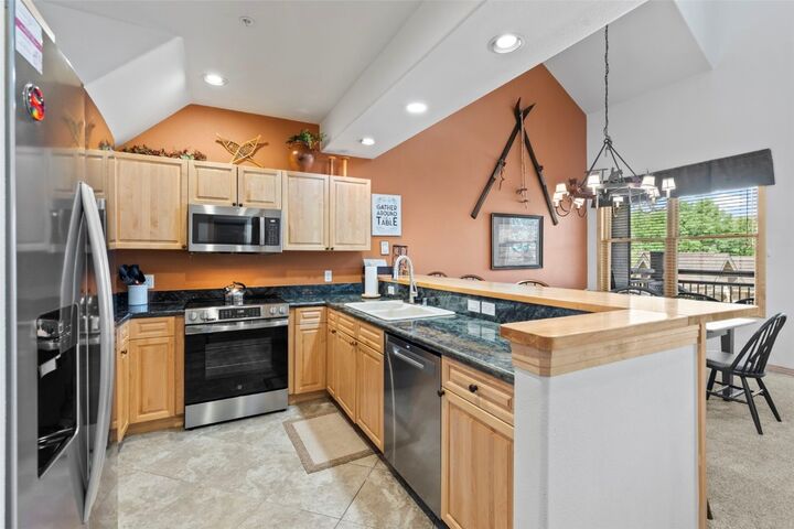 Property Photo:  33 Broken Lance Drive 207S  CO 80424 