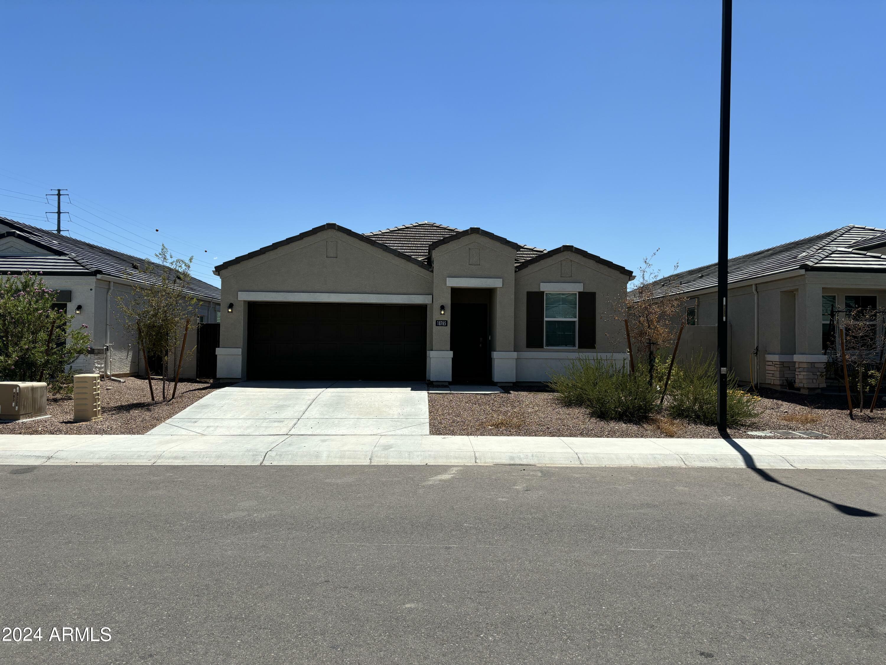 Property Photo: 18765 W Adams Street AZ 85326