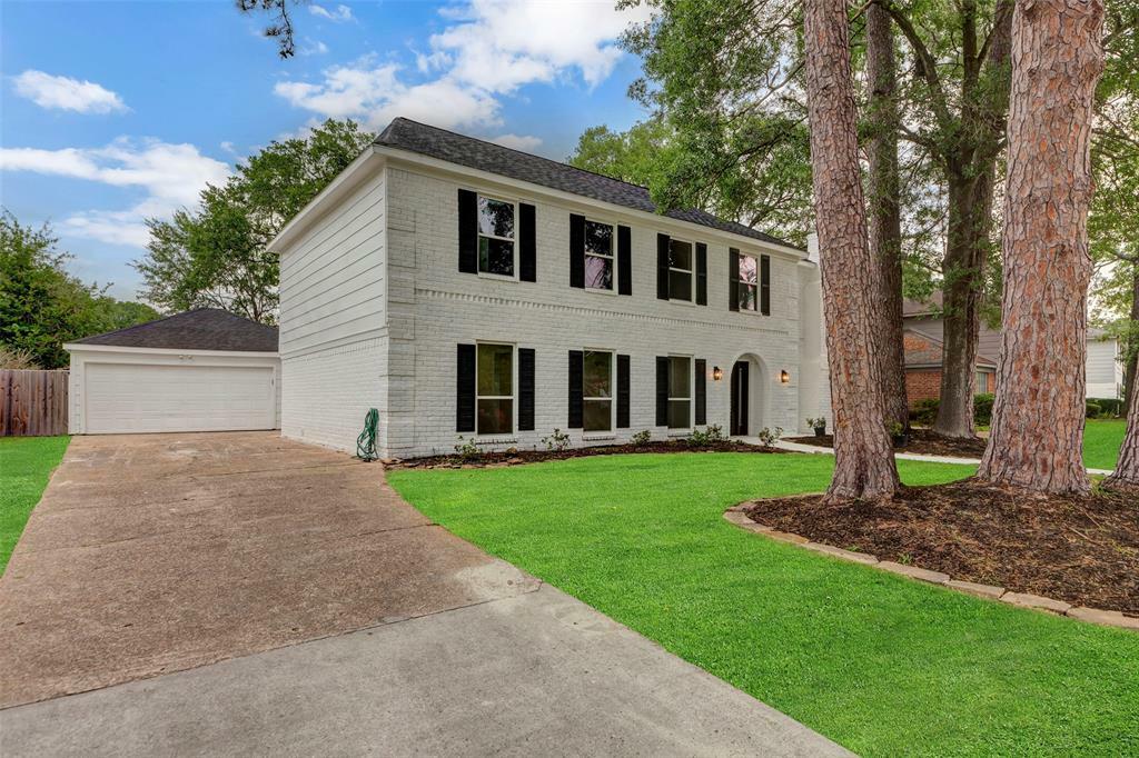 Property Photo: 7707 12th Fairway Lane TX 77346
