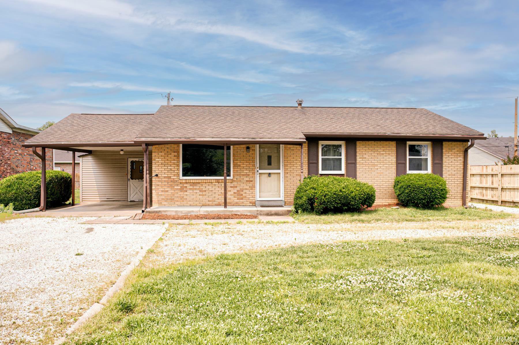 Property Photo:  6412 E Oak Street  IN 47715-3530 