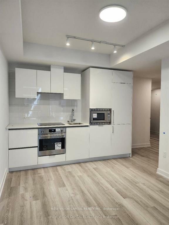 Property Photo: 238 Simcoe Street 1506 ON M5T 0E2
