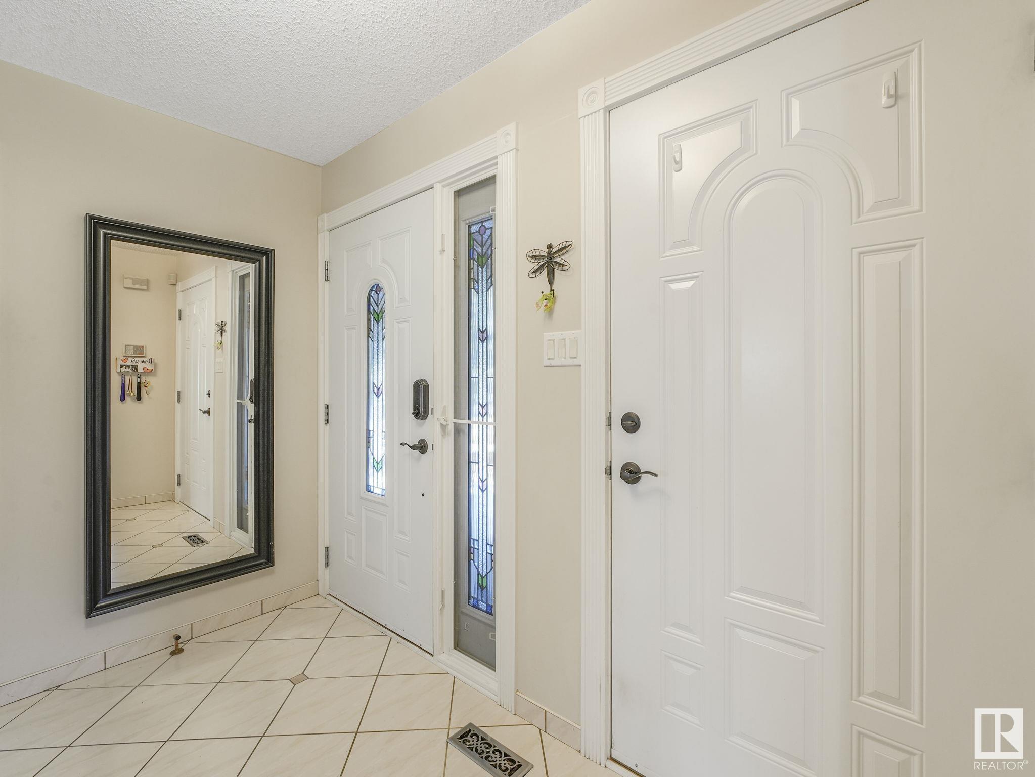 Property Photo: 14714 46 Avenue NW AB T6H 5M7