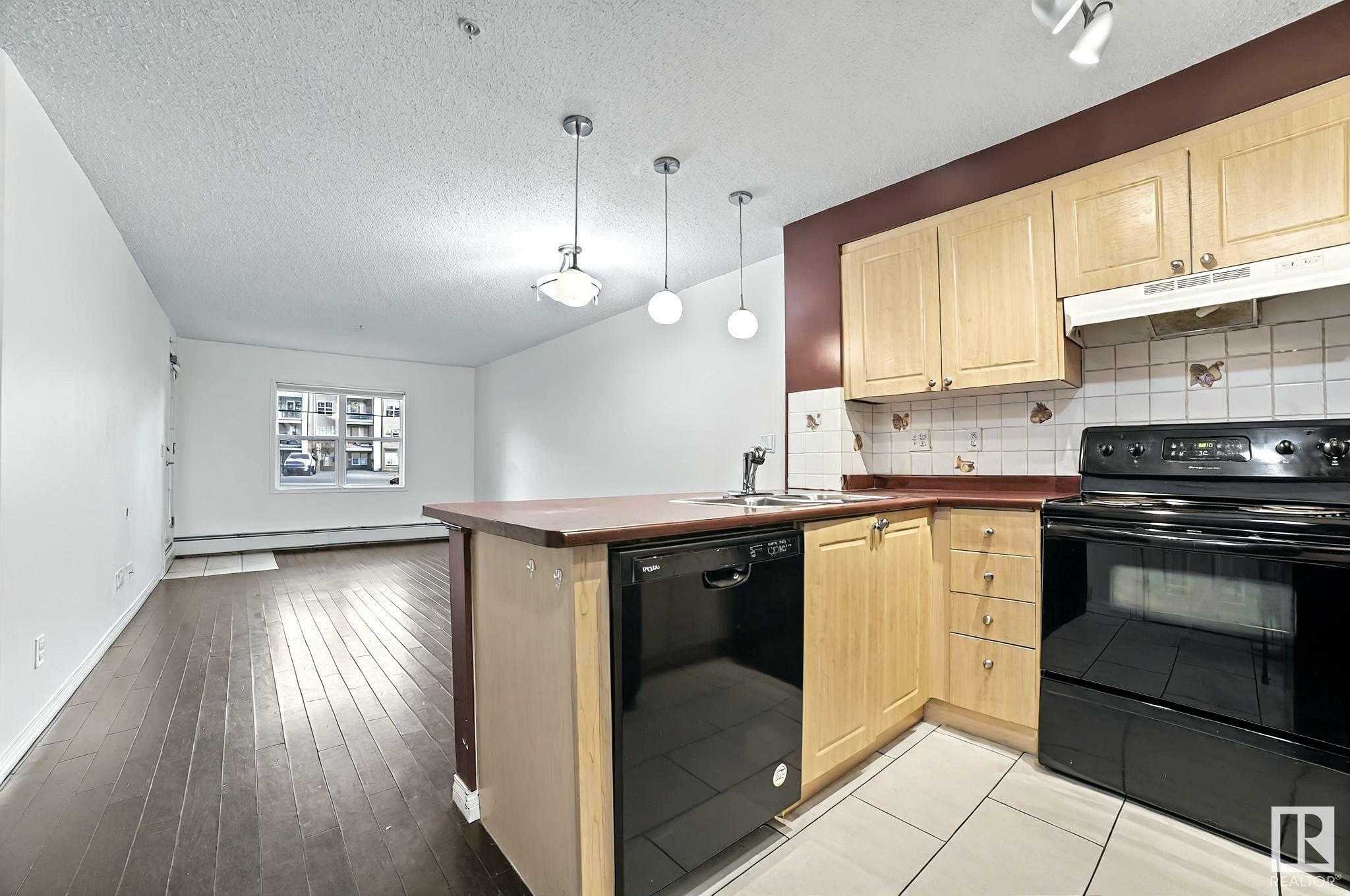 Property Photo: 622 McAllister Loop SW 111 AB T6W 1N1
