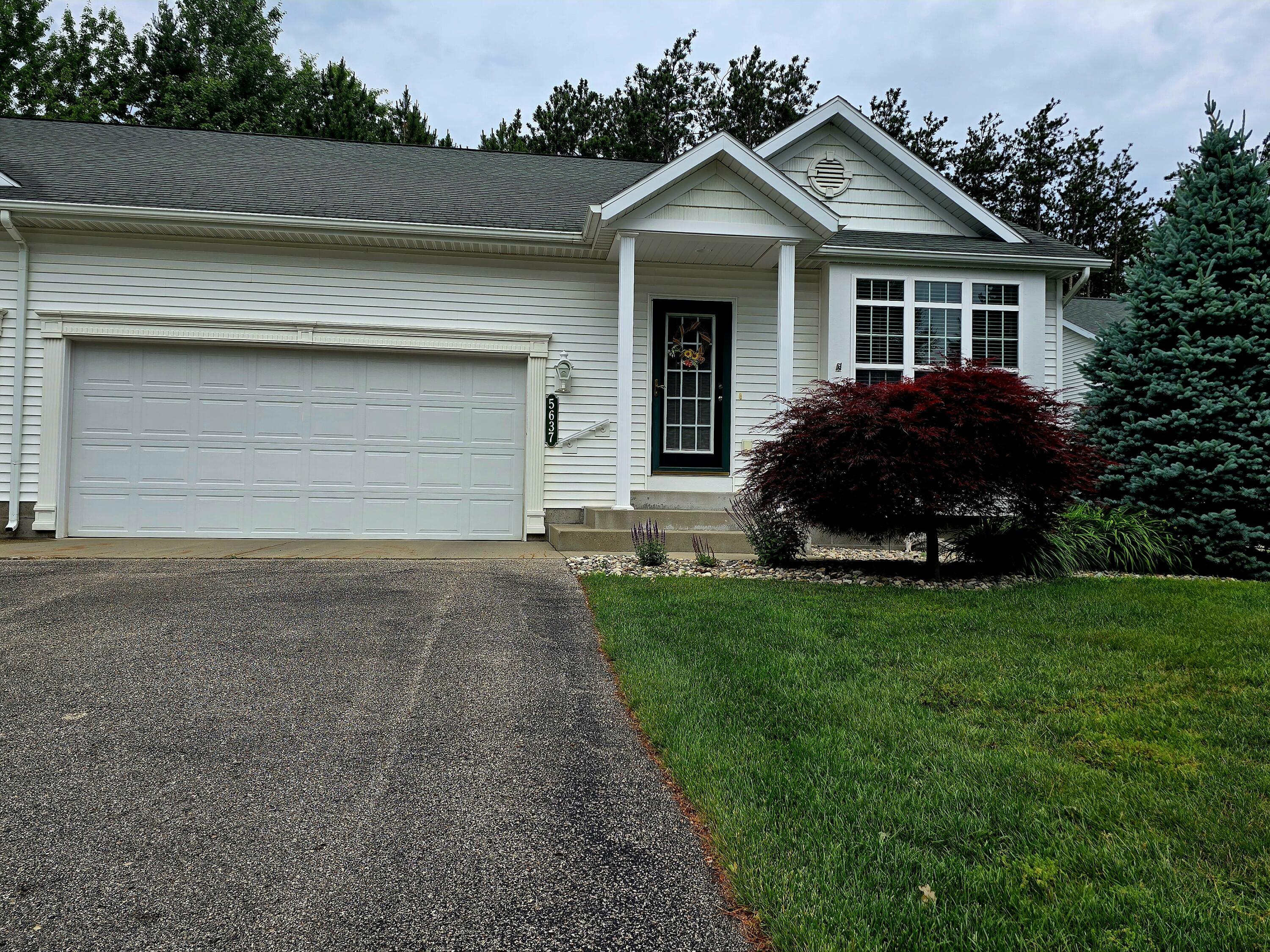 Property Photo: 5637 N Turning Leaf Way MI 49415