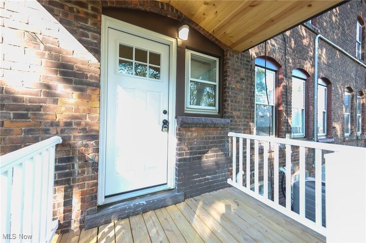 Property Photo:  1661 E 118th Street  OH 44106 