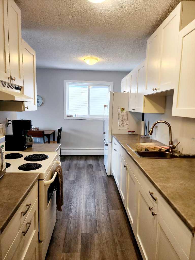 Property Photo: 4811 55 Street 306 AB T4N 2J2