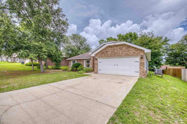 Property Photo:  5661 Maggie Rose Cir  FL 32570 