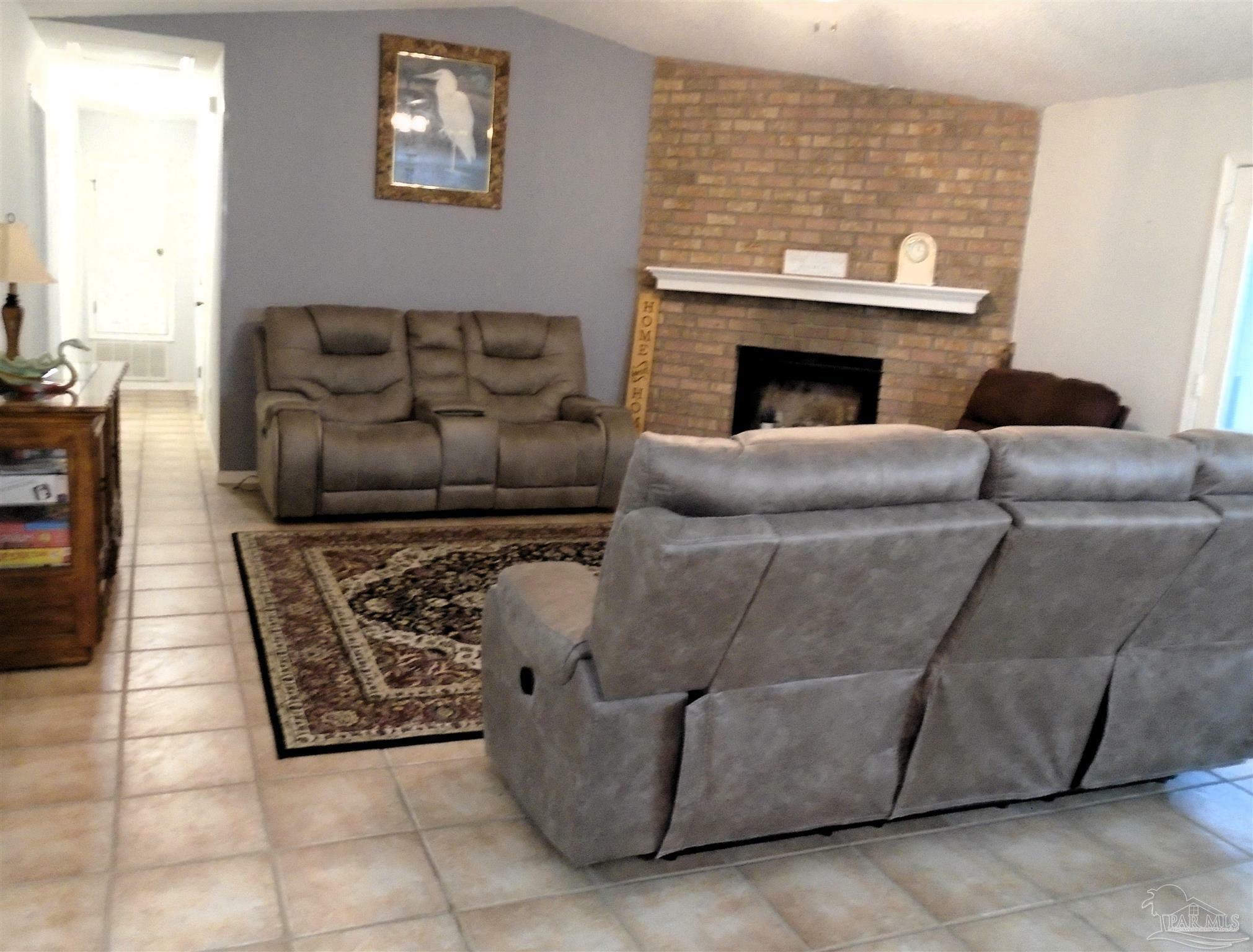 Property Photo: 7067 Pine Blossom Rd FL 32570