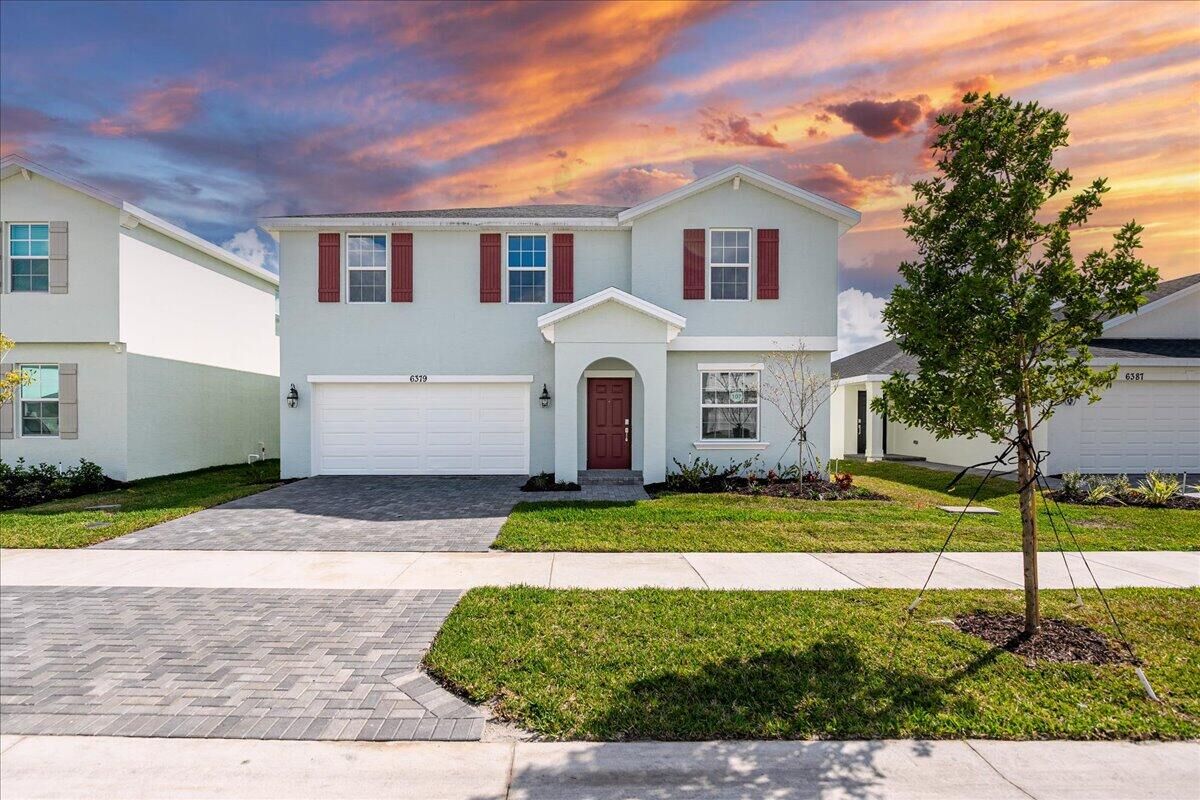 Property Photo:  6379 NW Windwood Way  FL 34987 