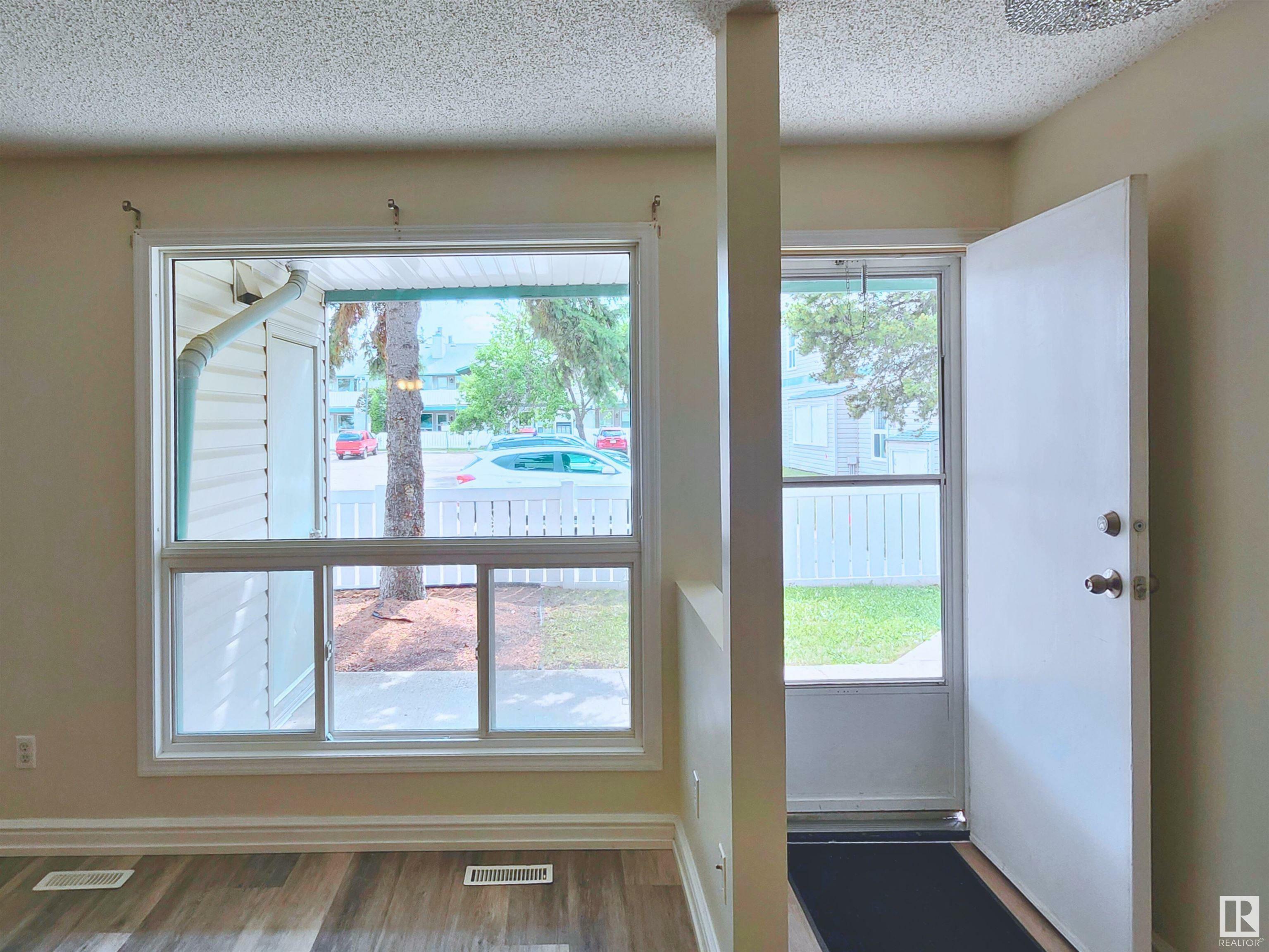 Property Photo:  2703 79 Street NW 97  AB T6K 3Z6 
