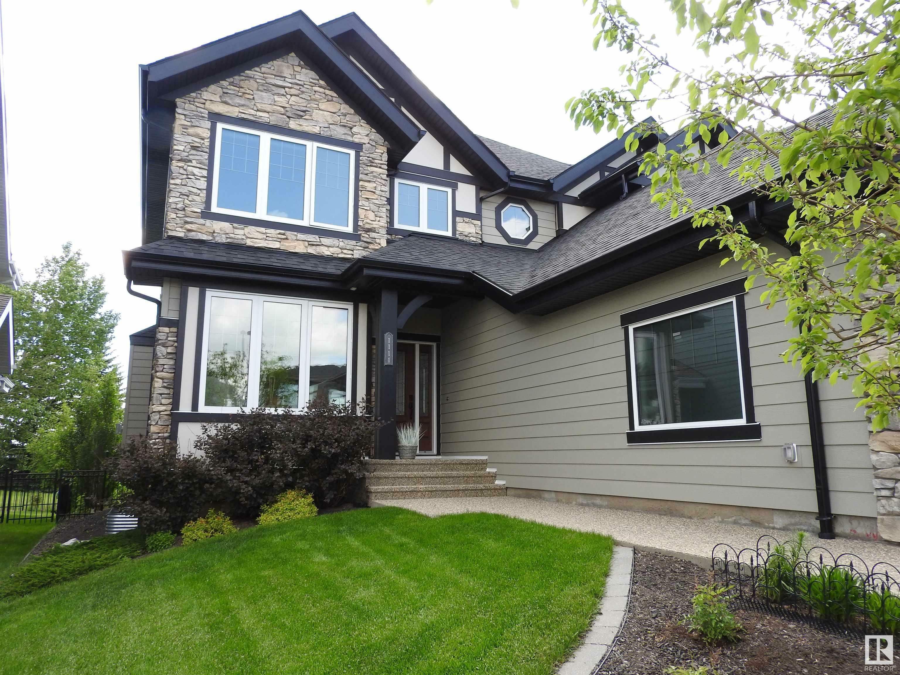 Property Photo: 1111 Hainstock Green SW AB T6W 2T8