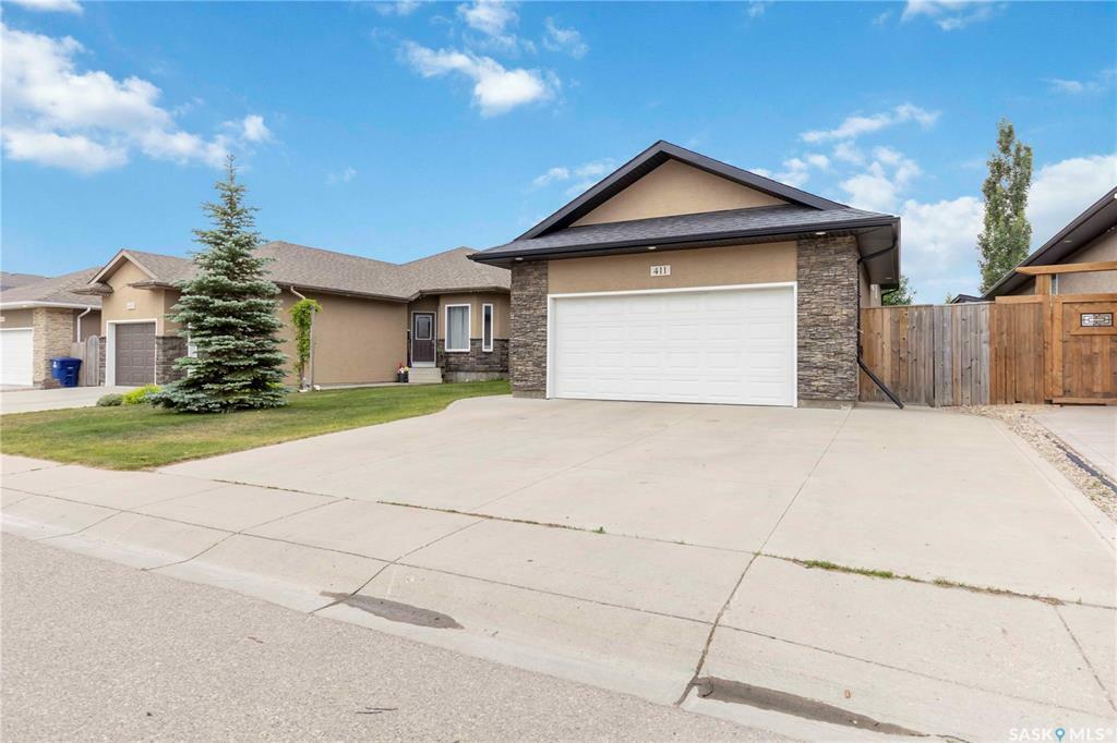 Property Photo: 411 Rempel Lane SK S7T 0J3