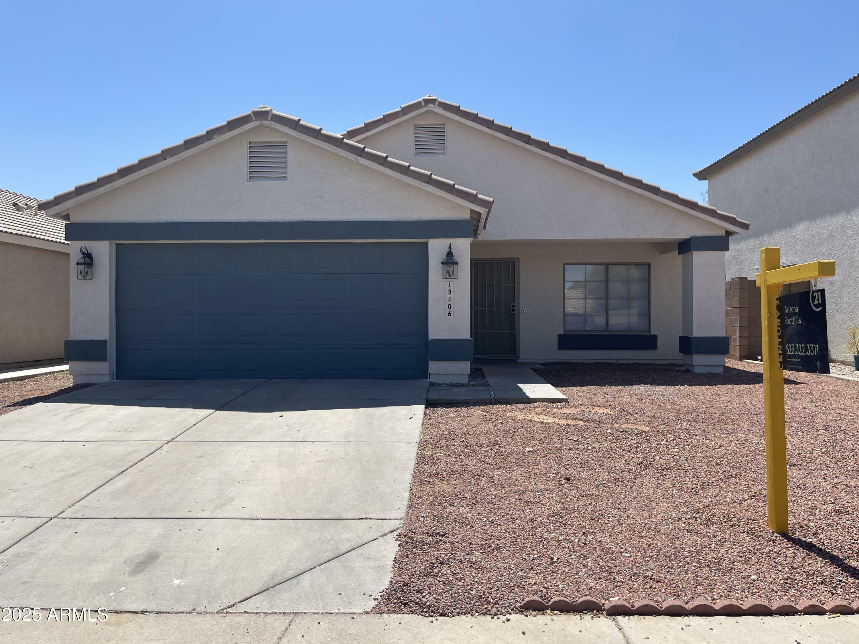 Property Photo: 13606 N 130th Avenue AZ 85335