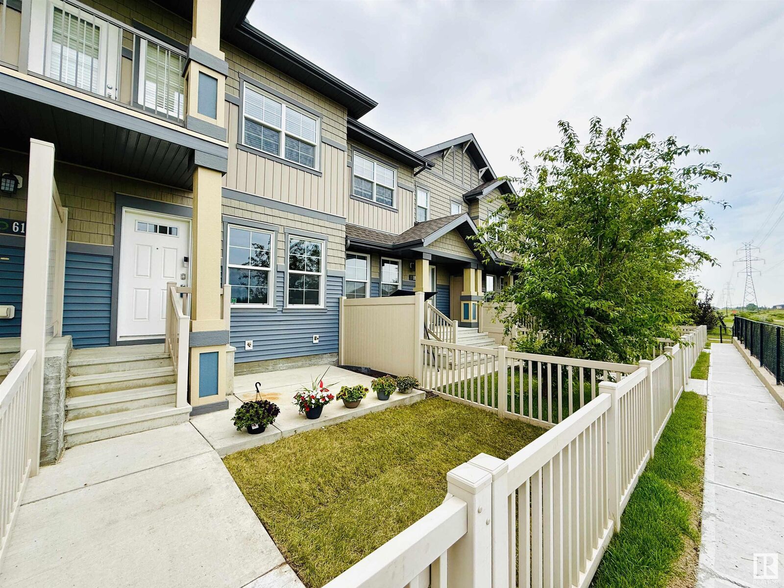 Property Photo: 4029 Orchards Drive SW 60 AB T6X 1V2