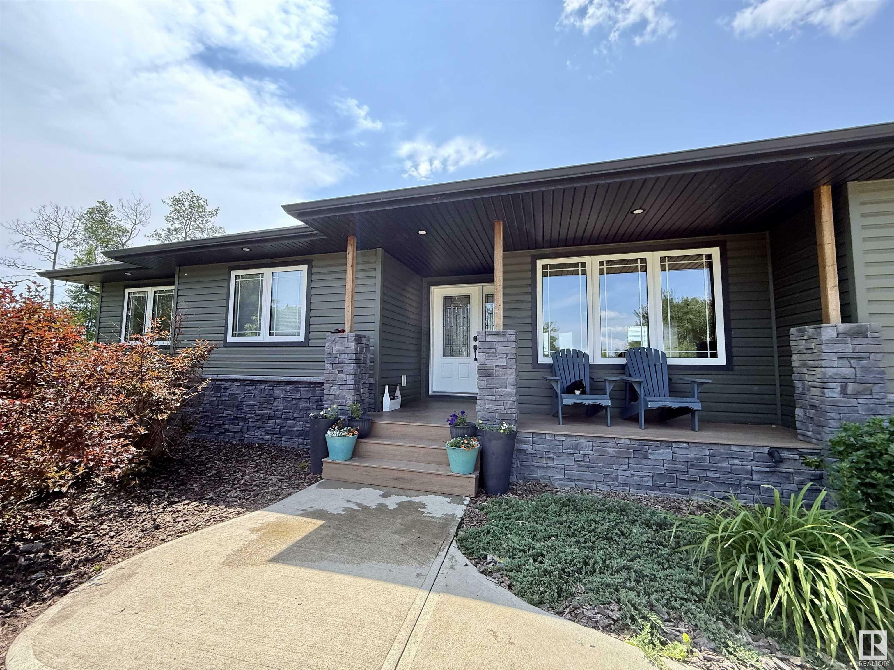 Property Photo: 10501 Twp Rd 590 AB T0A 3A0