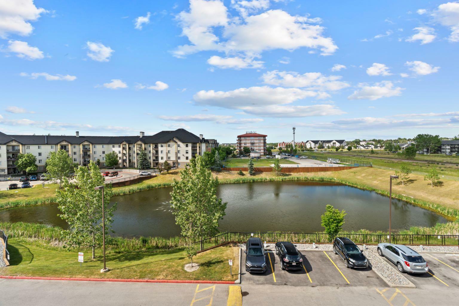 Property Photo: 304 Mackenzie Way SW 6406 AB T4B 3H6