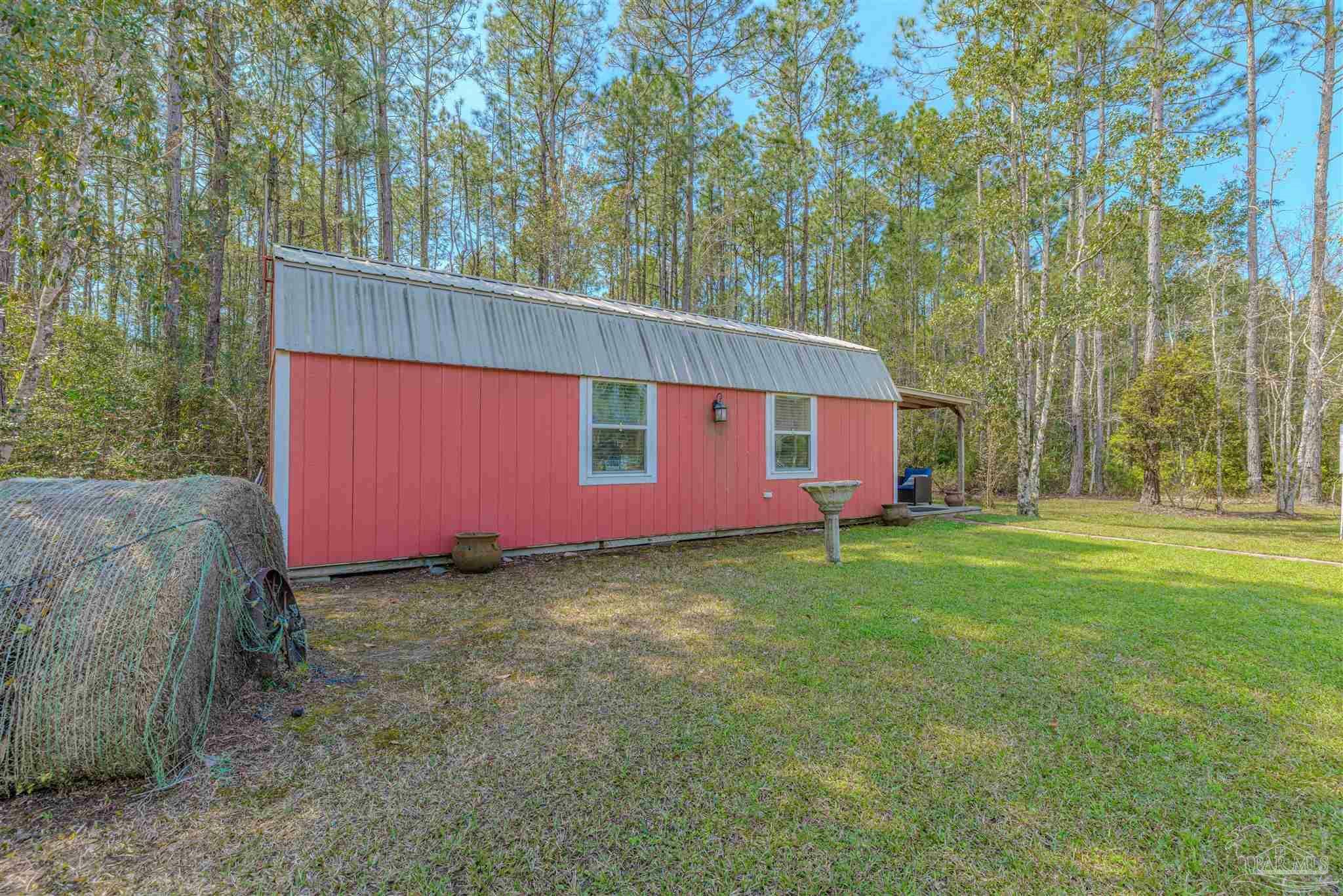 Property Photo: 4176 Coachman Rd FL 32583