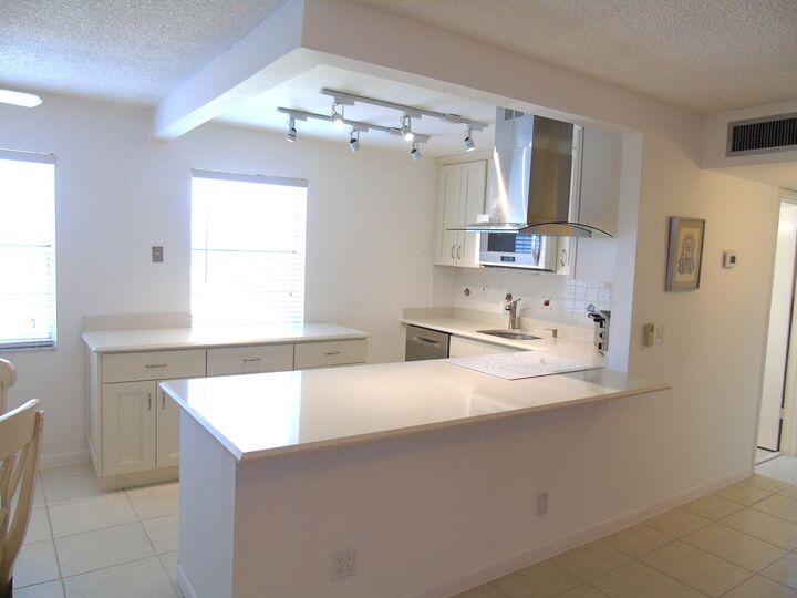 Property Photo: 219 Normandy E FL 33484