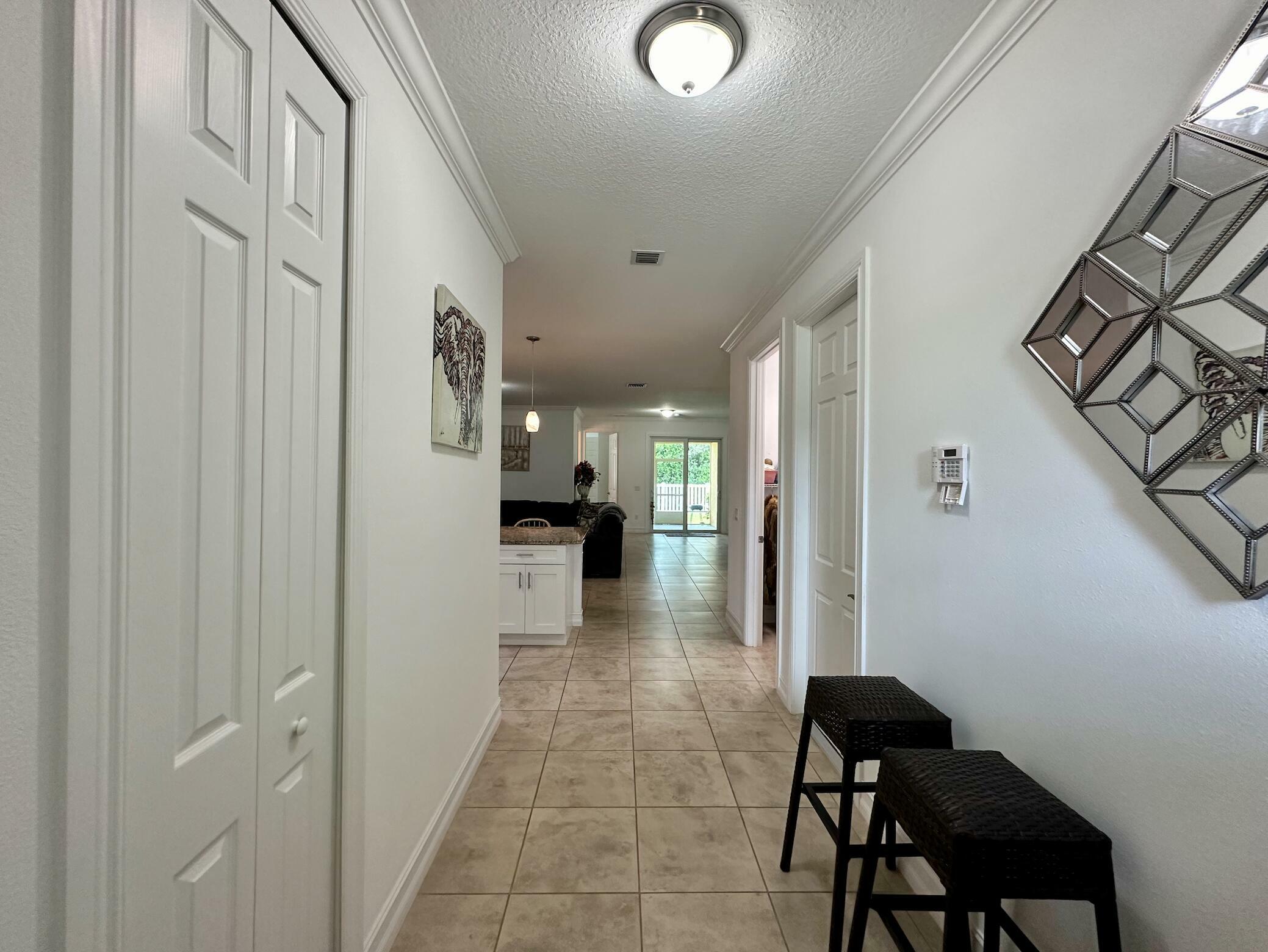Property Photo: 6112 NW Cullen Way FL 34983