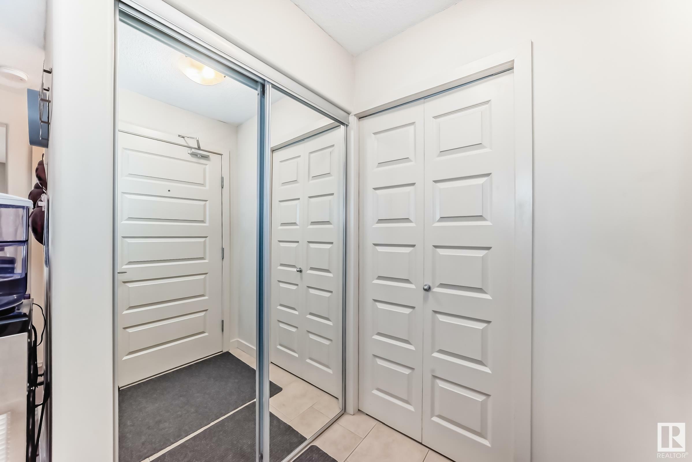Property Photo: 11615 Ellerslie Road SW 106 AB T6W 0J3