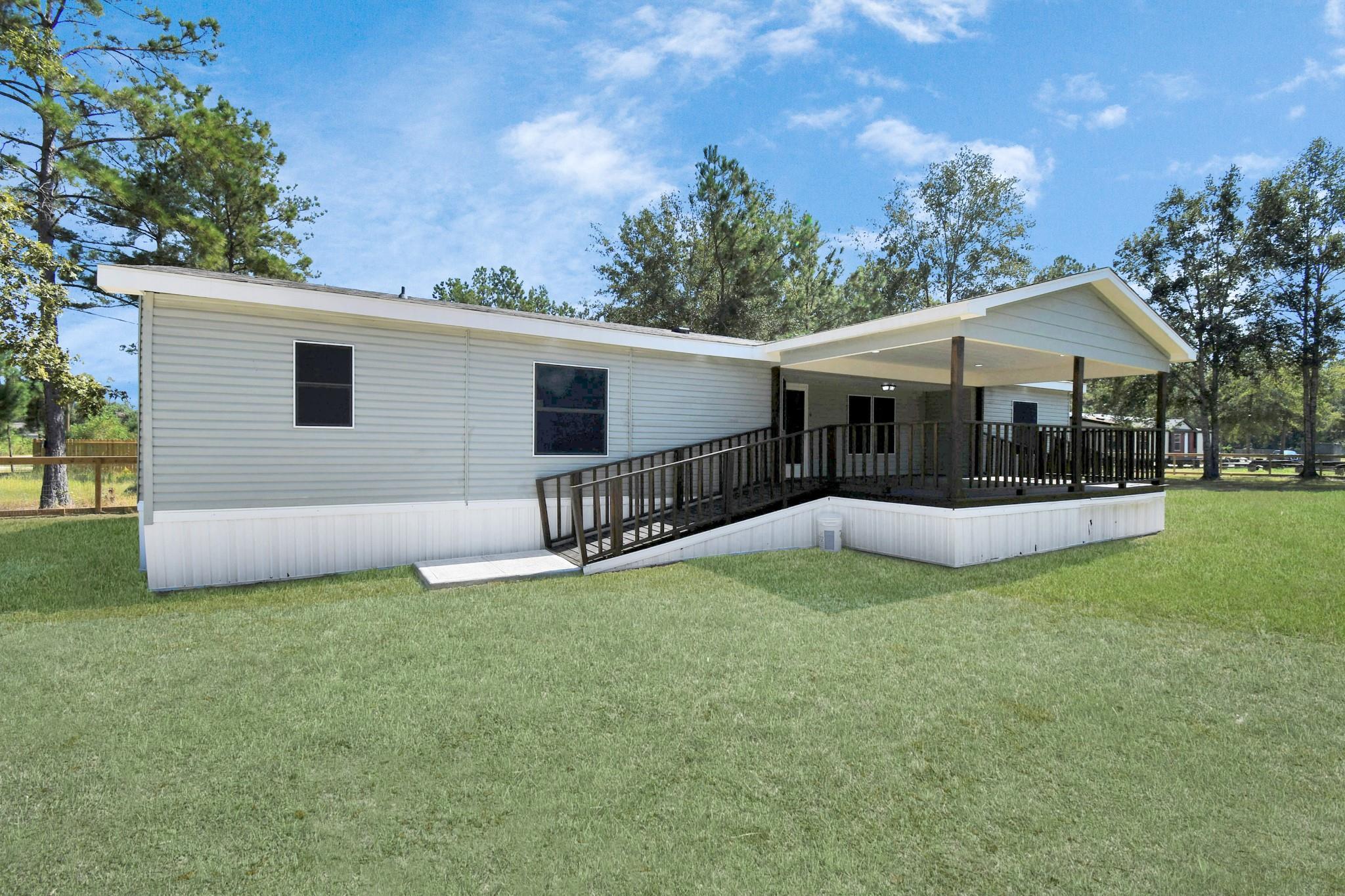 Property Photo: 422 County Road 3414 TX 77327