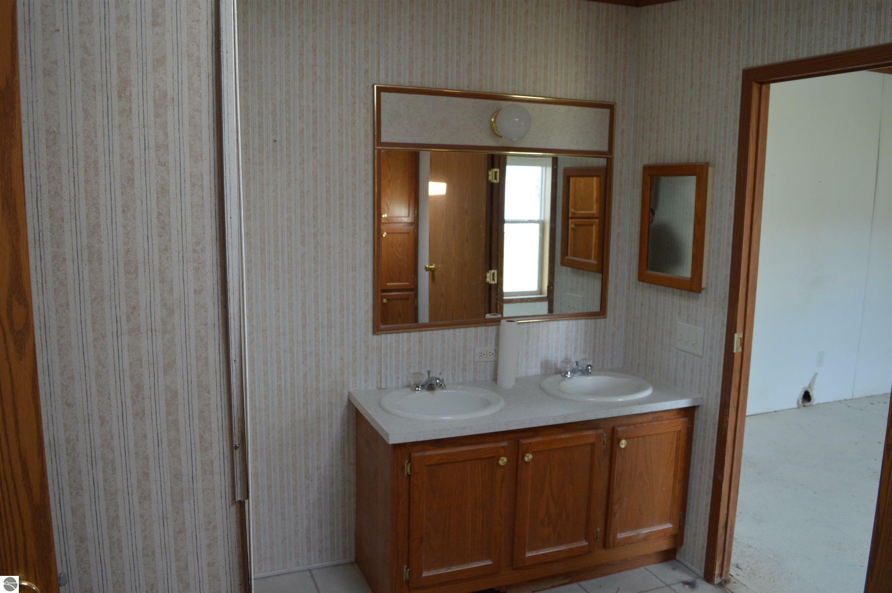 Property Photo:  7657 NW Blake Avenue  MI 49676 