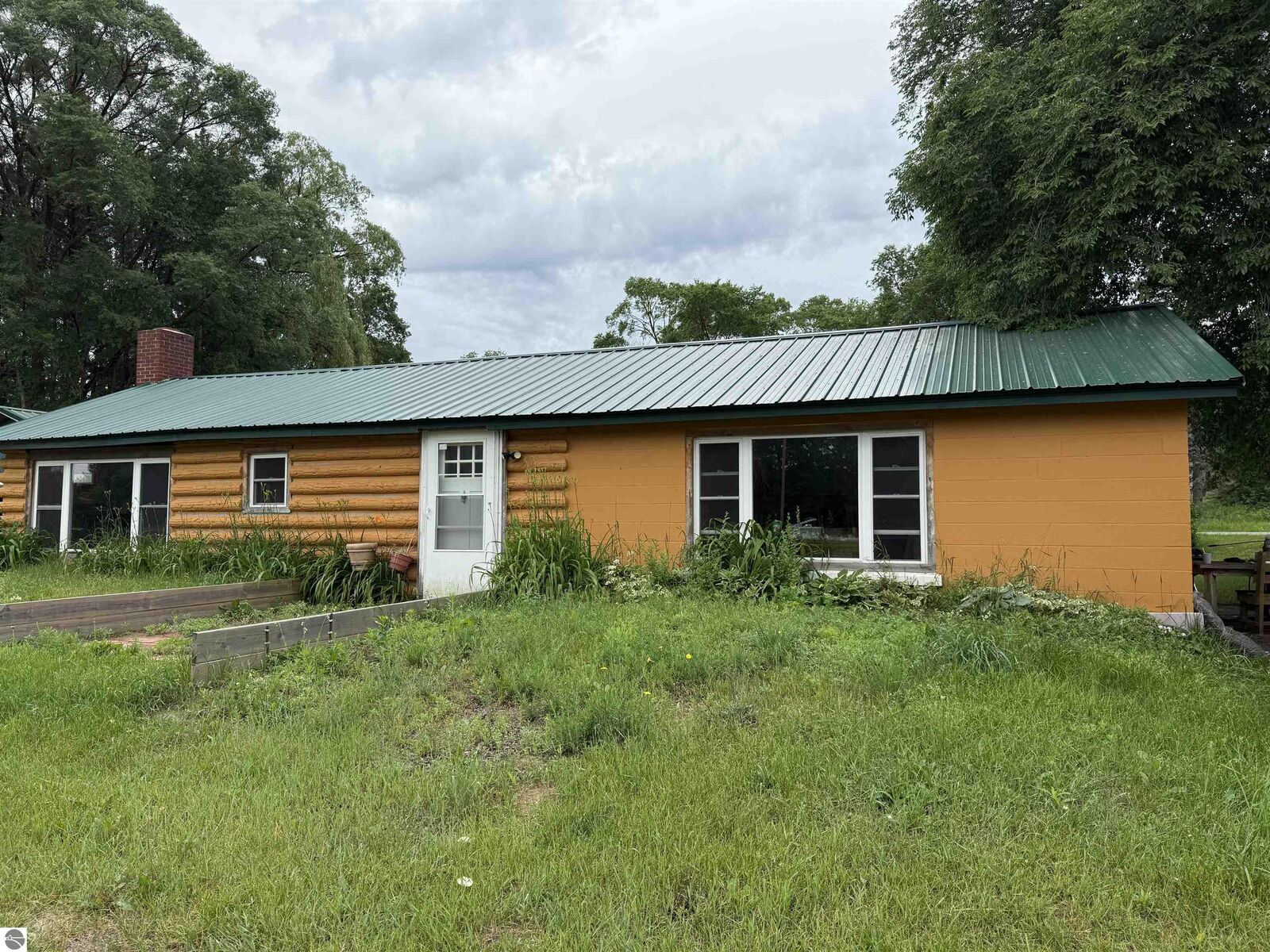Property Photo:  21025 Cadillac Highway  MI 49625