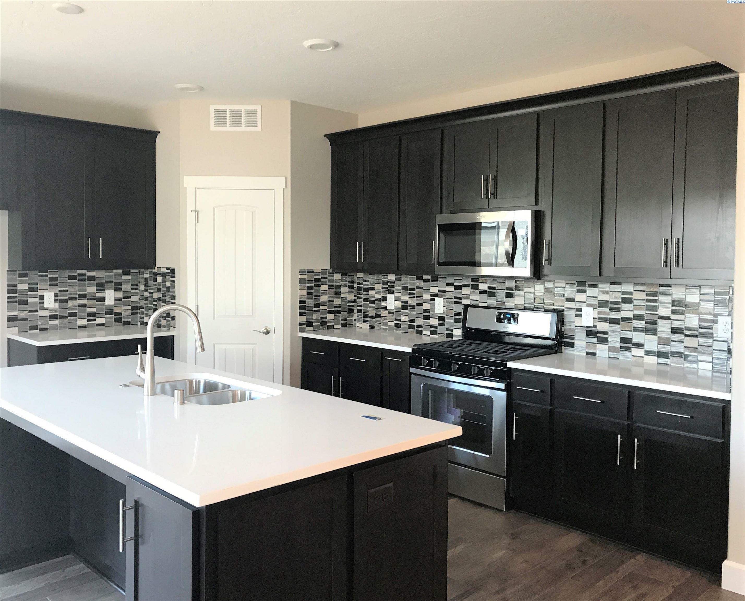 Property Photo: 8809 Bridger Court WA 99301