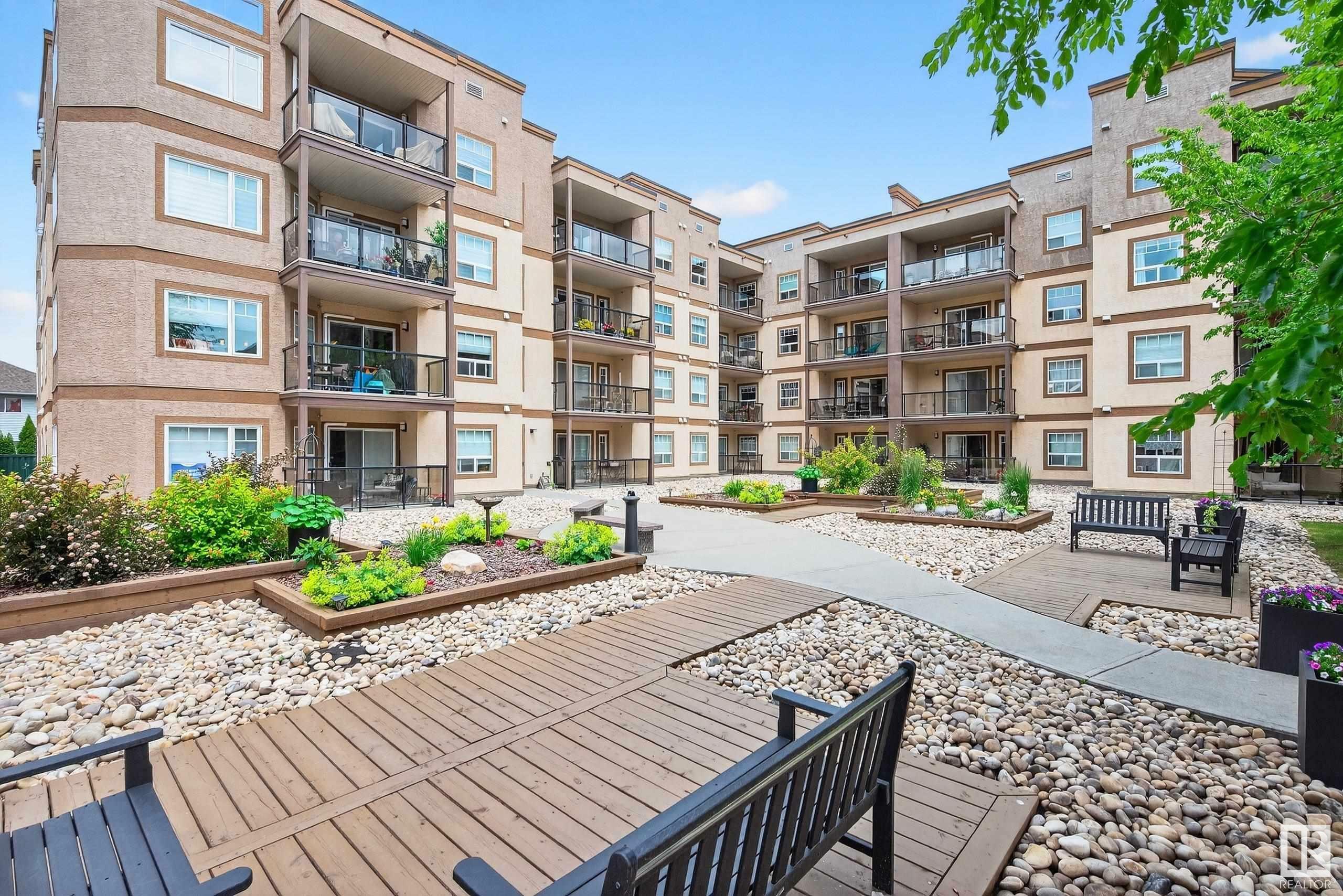 Property Photo: 2045 Grantham Court NW 125 AB T5T 3X6